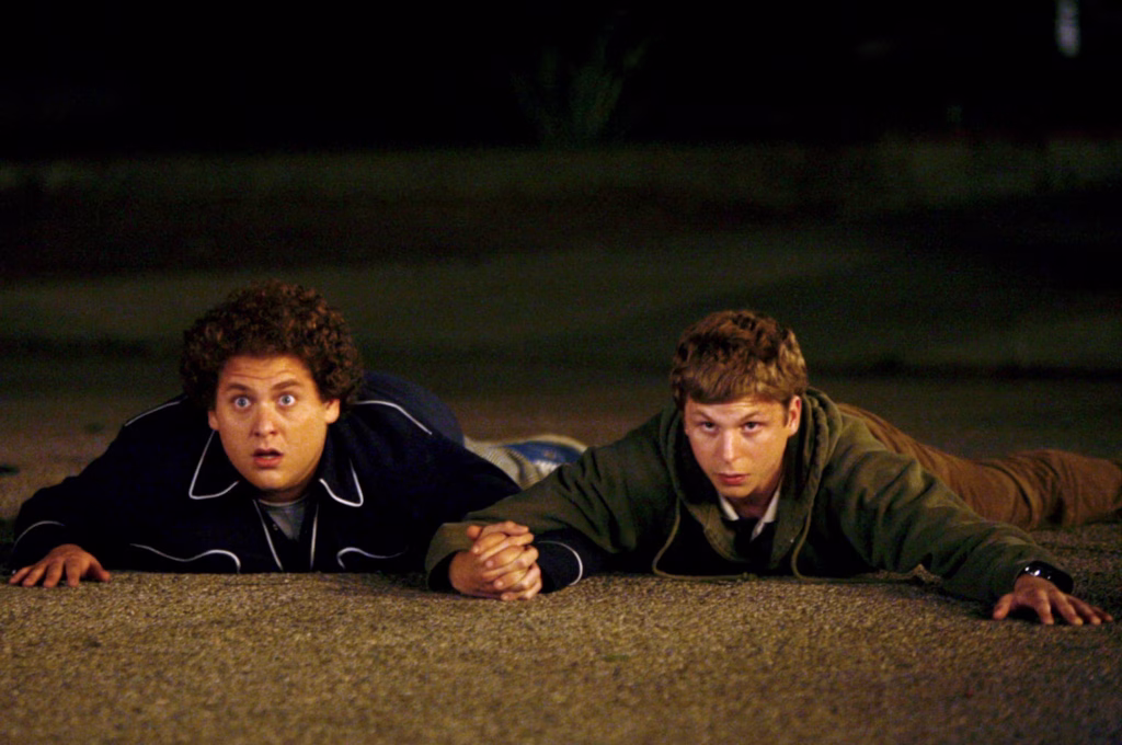 Jonah Hill and Michael Cera getting arrested by the cops in a scene from Superbad (Columbia)