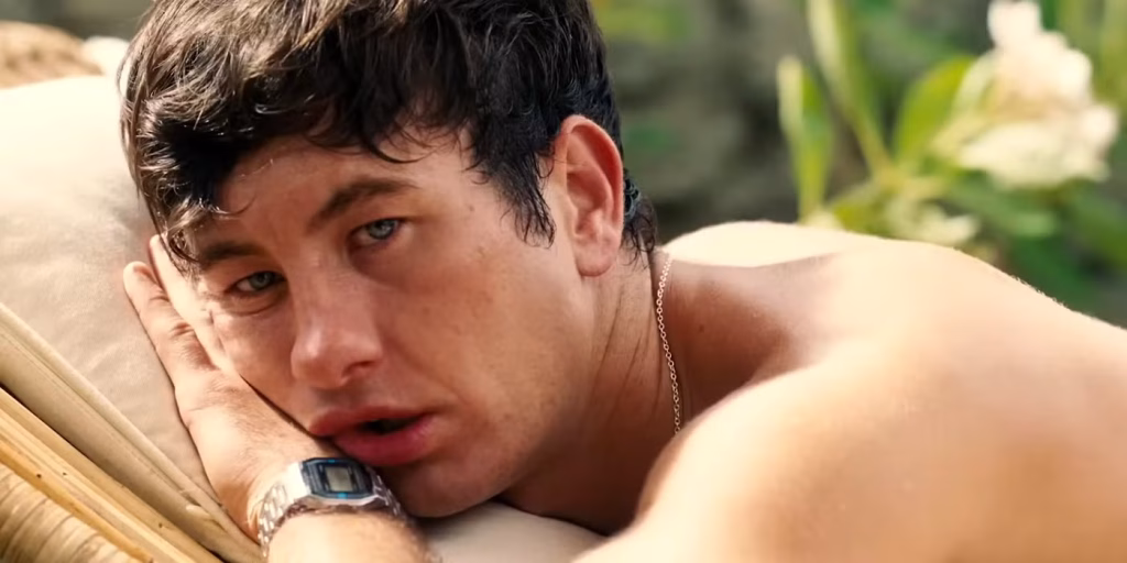 Barry Keoghan in a tense, atmospheric moment from Saltburn, set at a lavish country estate.