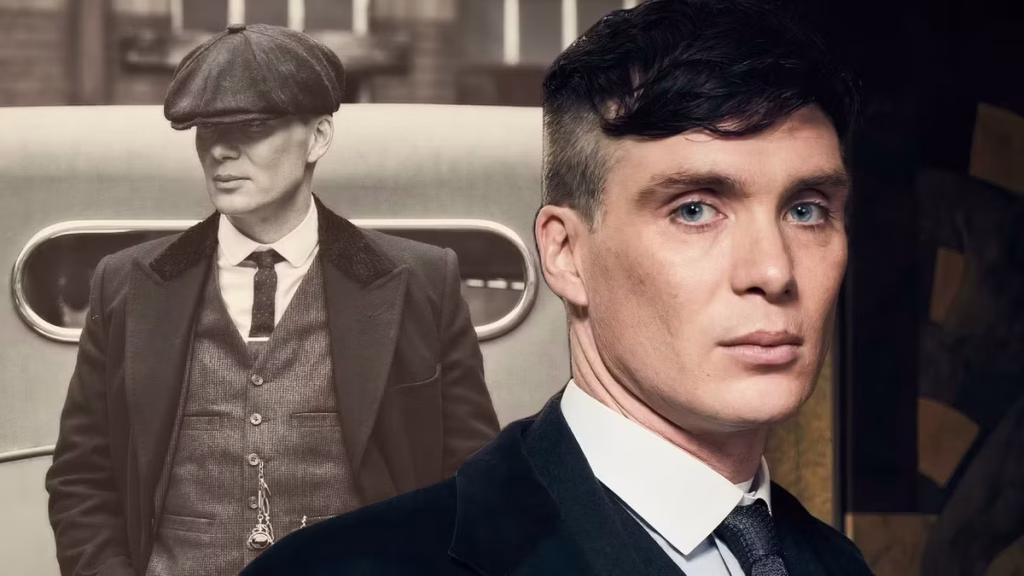 Cillian Murphy as Tommy Shelby stands in a dark suit and flat cap, looking tense in a first-look image from Peaky Blinders: The Immortal Man.